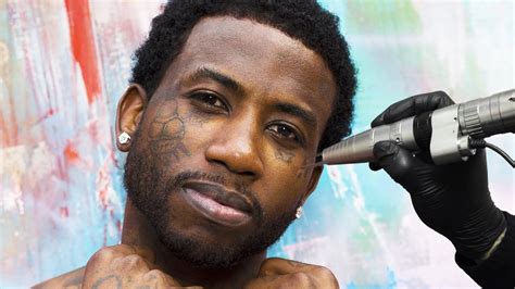 did gucci maine remove face tatto|Gucci Mane ice cream face tattoo.